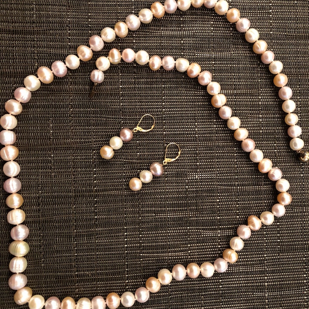 Fresh water cultured pearl necklace and earrings.